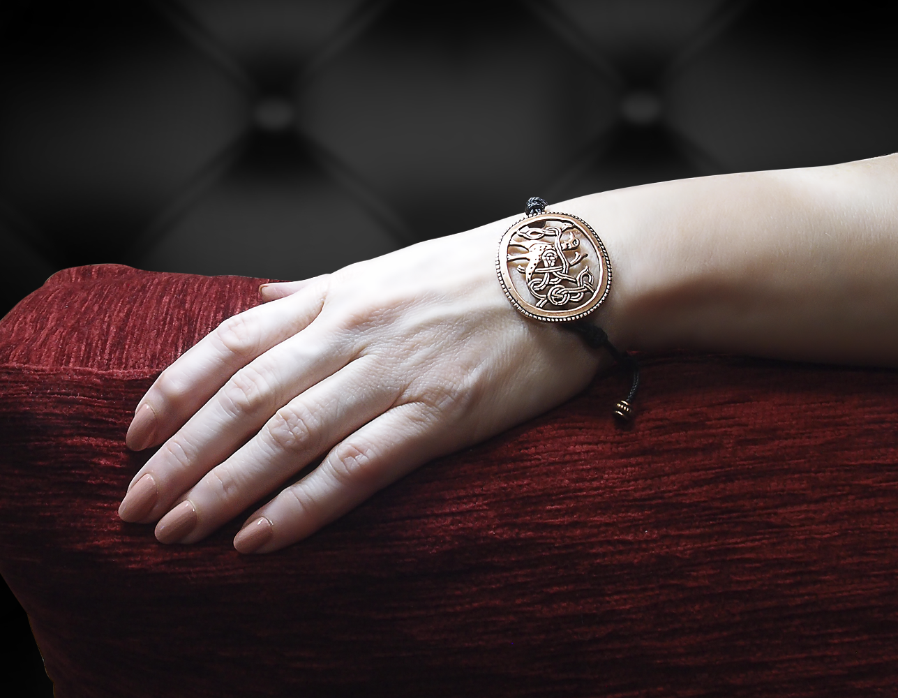 Cord bracelet "Bird with intertwined tail"
