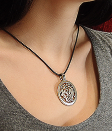 Slotted pendant "Suzdal hawks"