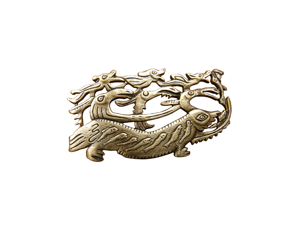 Brooch "Deity on a lizard"