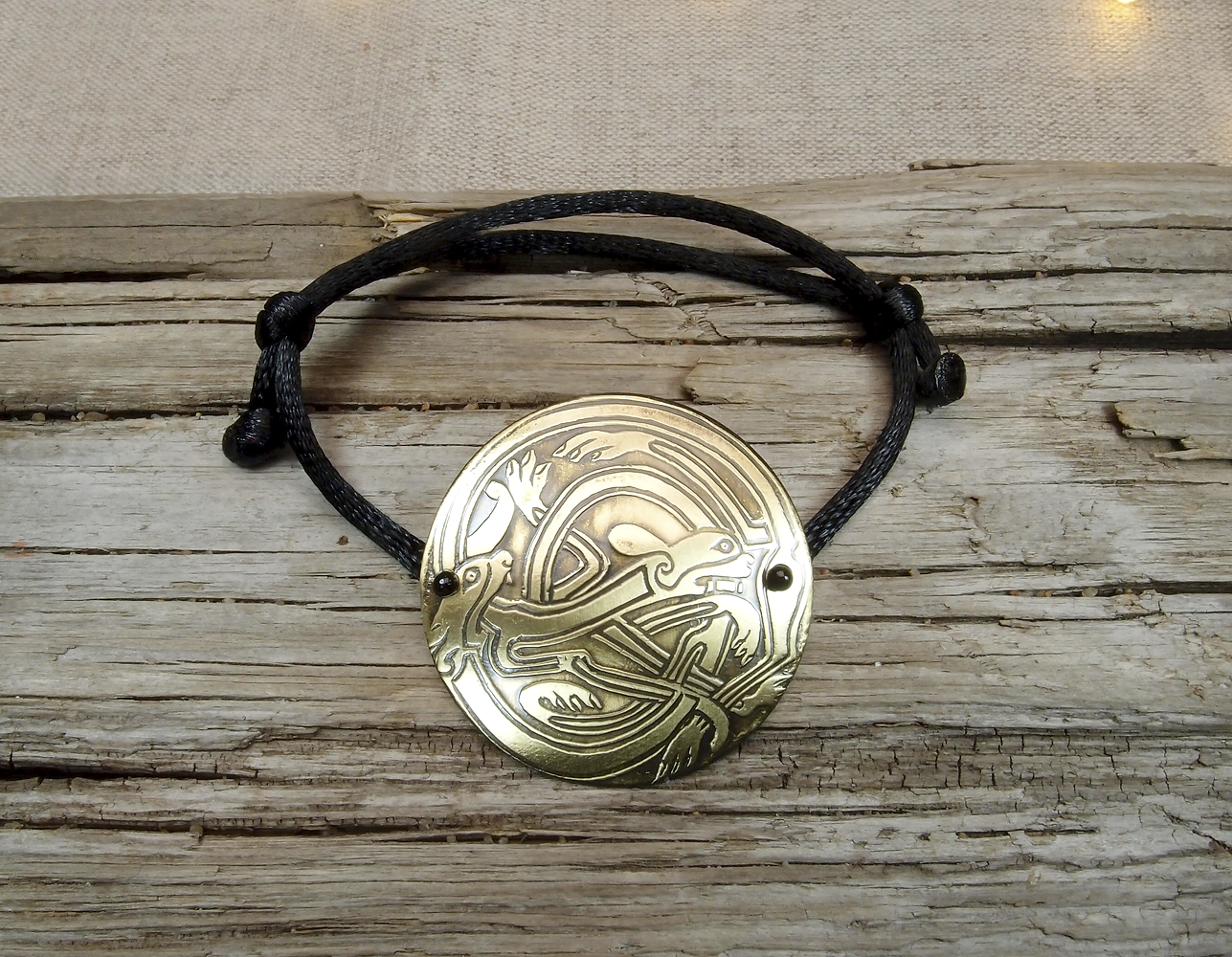 Bracelet-lace "Celtic intertwined dogs". Embossing