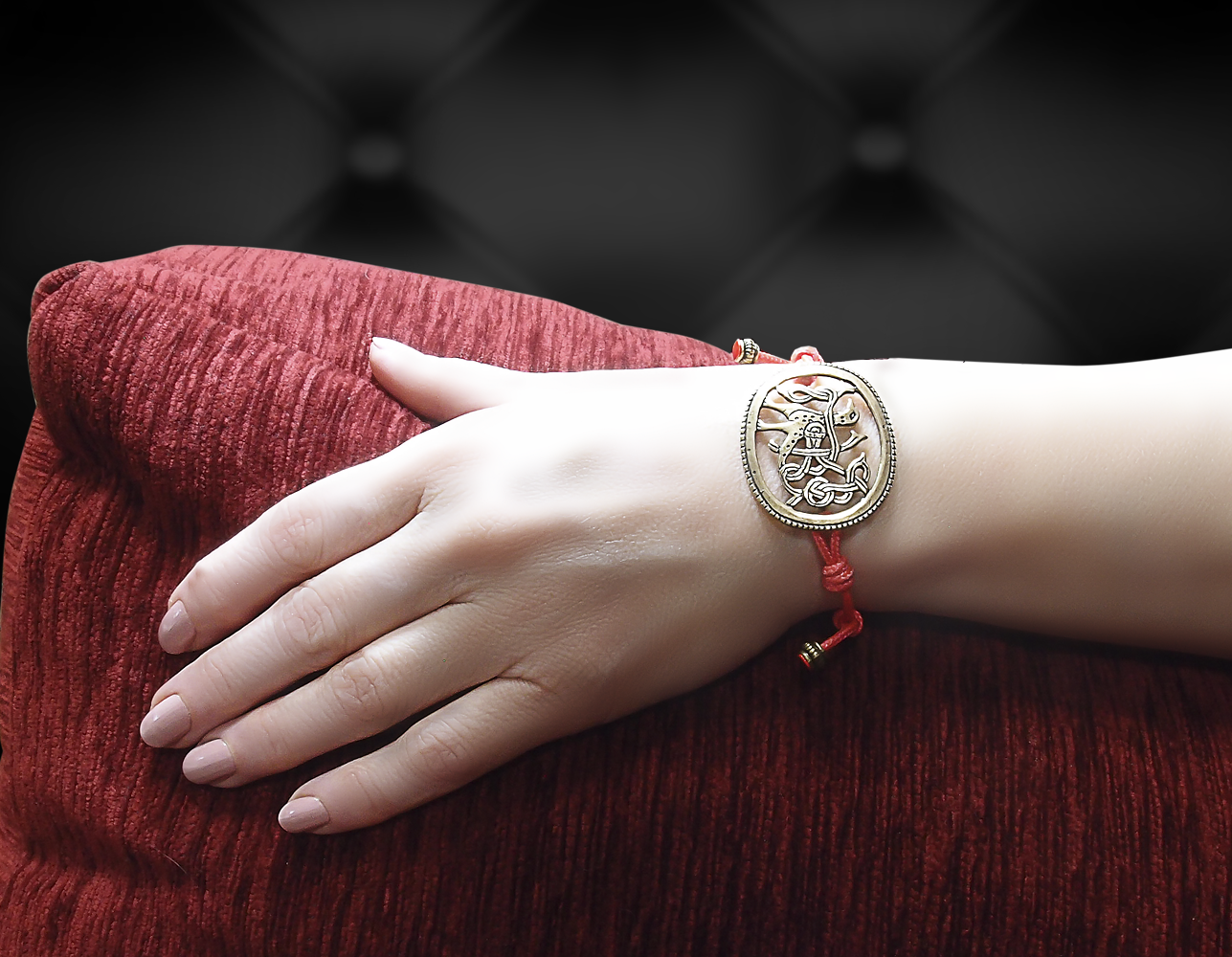 Cord bracelet "Bird with intertwined tail"