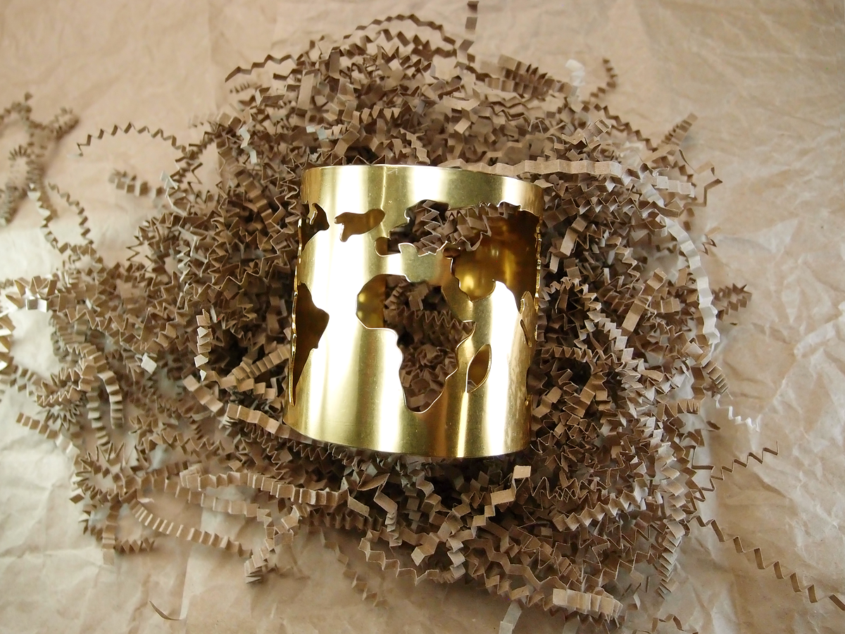 Bracelet slotted "Map of the world". Width 60 mm