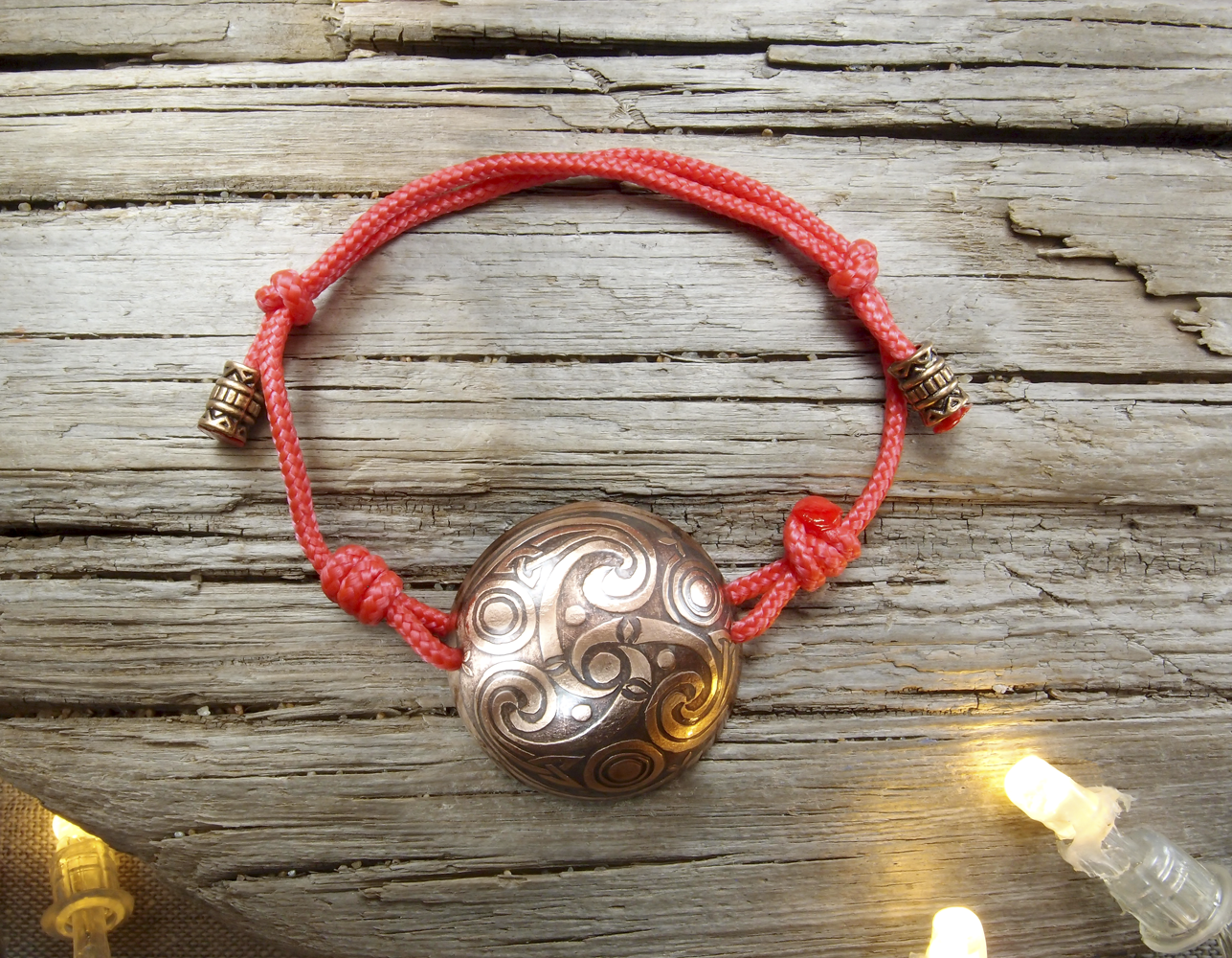 Spherical bracelet-cord "Three-legged Kolovrat"