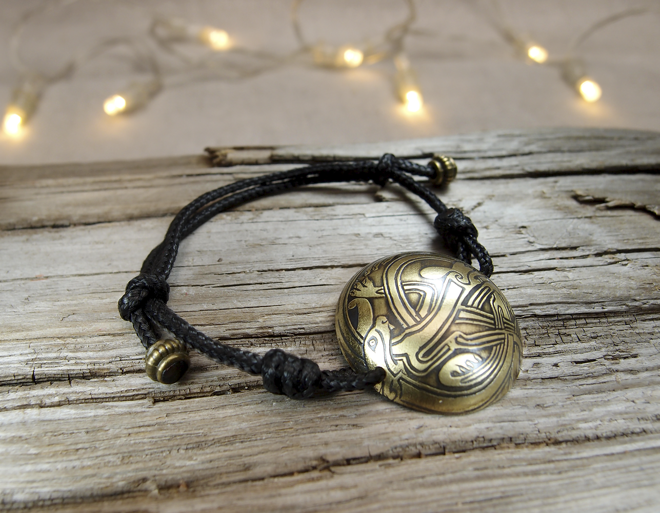 Spherical bracelet-lace "Celtic intertwined dogs"